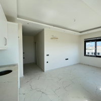 Modern 1+1 Apartment with Sea View in Mahmutlar — Attractive Investment Opportunity