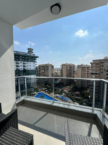 Fully Furnished 1+1 Apartment Near the Sea with Hotel-Style Facilities in Mahmutlar