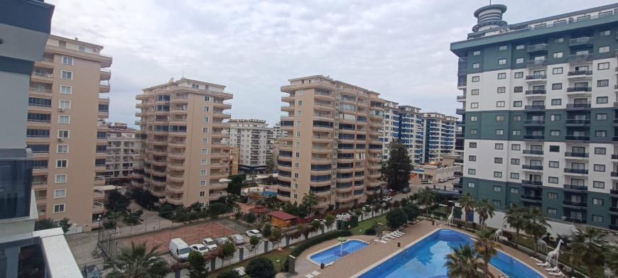 Fully Furnished 1+1 Apartment Near the Sea with Hotel-Style Facilities in Mahmutlar
