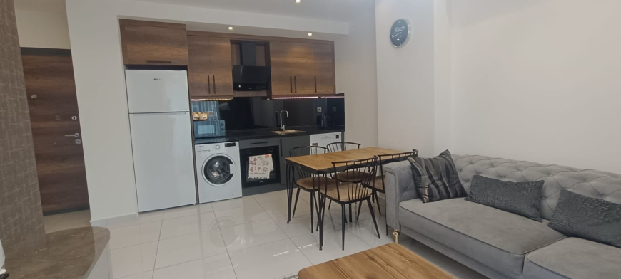 Fully Furnished 1+1 Apartment Near the Sea with Hotel-Style Facilities in Mahmutlar