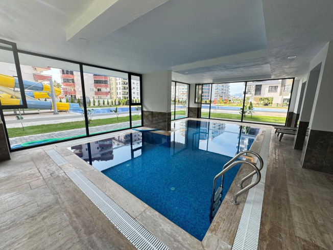 Modern 1+1 Apartment in Mahmutlar with Resort-Style Facilities, 500 m from the Sea