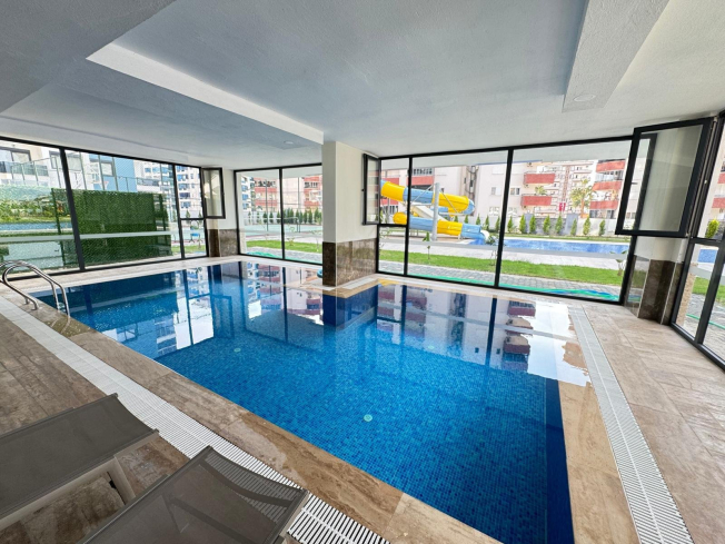 Modern 1+1 Apartment in Mahmutlar with Resort-Style Facilities, 500 m from the Sea
