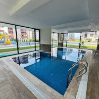Modern 1+1 Apartment in Mahmutlar with Resort-Style Facilities, 500 m from the Sea
