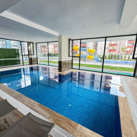 Modern 1+1 Apartment in Mahmutlar with Resort-Style Facilities, 500 m from the Sea