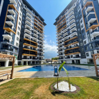 Modern 1+1 Apartment in Mahmutlar with Resort-Style Facilities, 500 m from the Sea