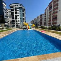 Modern 1+1 Apartment in Mahmutlar with Resort-Style Facilities, 500 m from the Sea