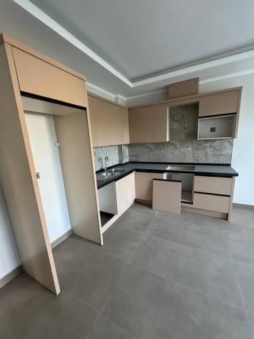 New 1+1 Apartment in Mahmutlar with Full On-Site Facilities, 600 m from the Sea