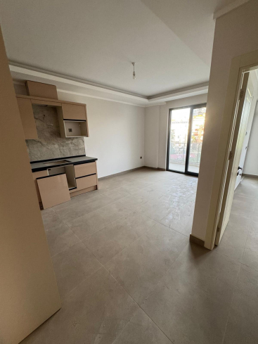 New 1+1 Apartment in Mahmutlar with Full On-Site Facilities, 600 m from the Sea