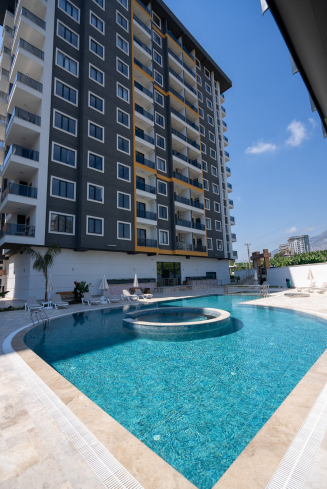 New 1+1 Apartment in Mahmutlar with Full On-Site Facilities, 600 m from the Sea