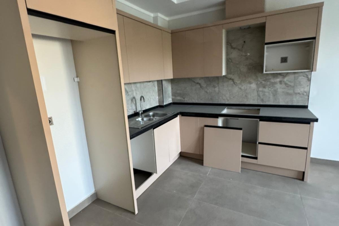 New 1+1 Apartment in Mahmutlar with Full On-Site Facilities, 600 m from the Sea