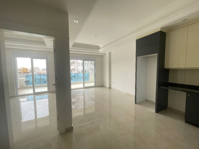 Modern 1+1 Apartment in Mahmutlar with Resort Facilities and Rental Potential