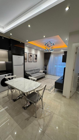 Modern 1+1 Apartment with Resort-Style Infrastructure and High Rental Potential in Mahmutlar