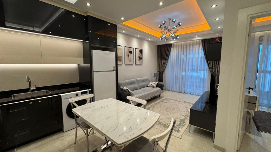 Modern 1+1 Apartment with Resort-Style Infrastructure and High Rental Potential in Mahmutlar