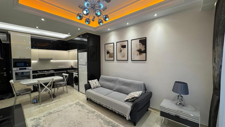 Modern 1+1 Apartment with Resort-Style Infrastructure and High Rental Potential in Mahmutlar