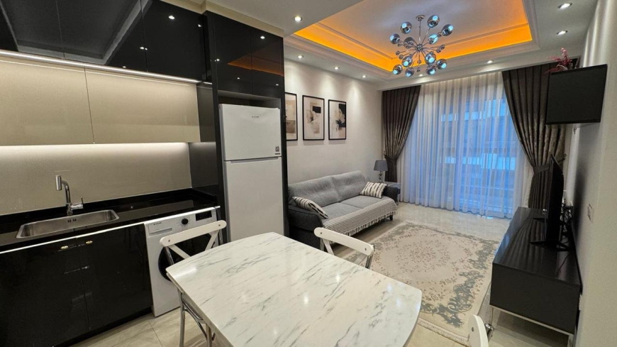 Modern 1+1 Apartment with Resort-Style Infrastructure and High Rental Potential in Mahmutlar