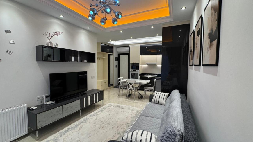 Modern 1+1 Apartment with Resort-Style Infrastructure and High Rental Potential in Mahmutlar