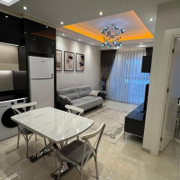 Modern 1+1 Apartment with Resort-Style Infrastructure and High Rental Potential in Mahmutlar