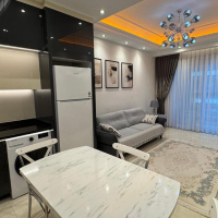 Modern 1+1 Apartment with Resort-Style Infrastructure and High Rental Potential in Mahmutlar