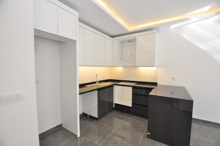 New 1+1 apartment in Mahmutlar with installment plan near the sea