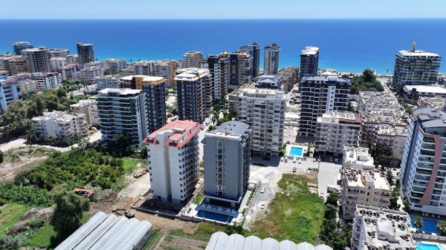 New 1+1 apartment in Mahmutlar with installment plan near the sea