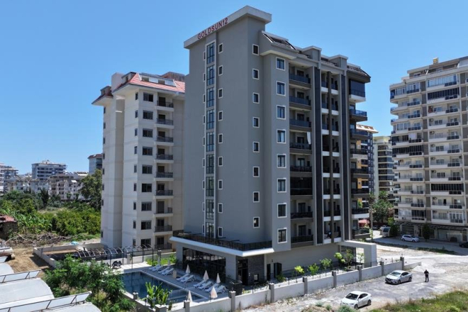 New 1+1 apartment in Mahmutlar with installment plan near the sea