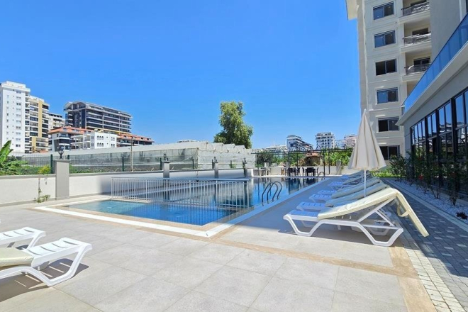 New 1+1 apartment in Mahmutlar with installment plan near the sea