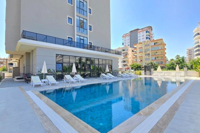 New 1+1 apartment in Mahmutlar with installment plan near the sea