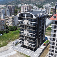 New 1+1 apartment in Mahmutlar with installment plan near the sea
