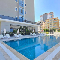New 1+1 apartment in Mahmutlar with installment plan near the sea
