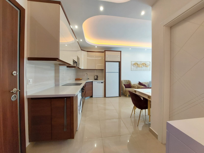 Modern Apartment in Mahmutlar with Resort Facilities and Rental Opportunity