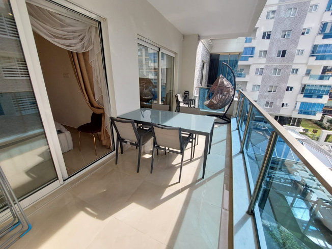 Modern Apartment in Mahmutlar with Resort Facilities and Rental Opportunity