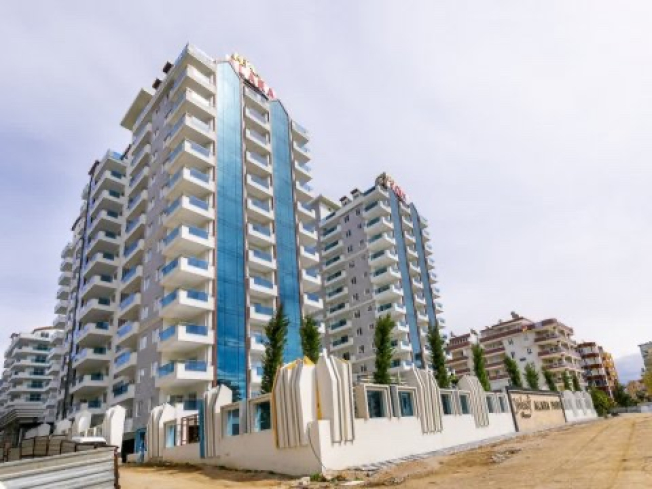 Modern Apartment in Mahmutlar with Resort Facilities and Rental Opportunity