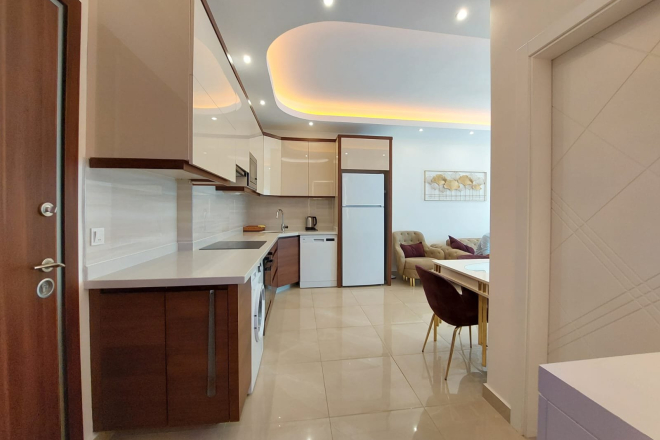 Modern Apartment in Mahmutlar with Resort Facilities and Rental Opportunity