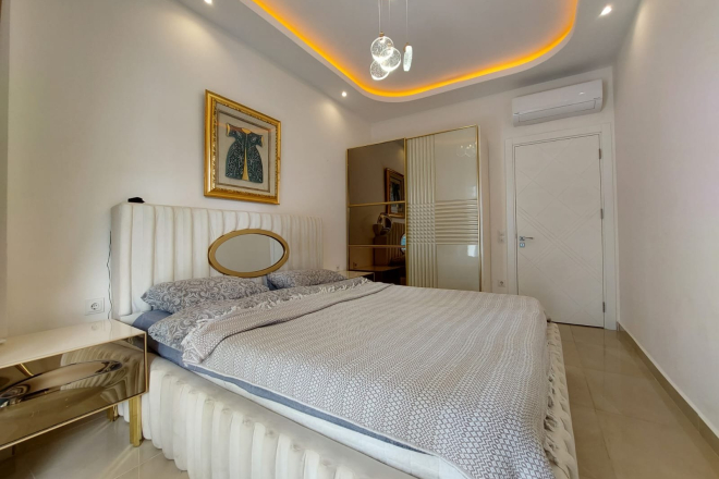 Modern Apartment in Mahmutlar with Resort Facilities and Rental Opportunity