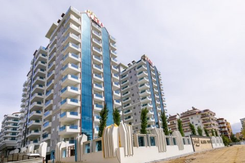 Modern Apartment in Mahmutlar with Resort Facilities and Rental Opportunity