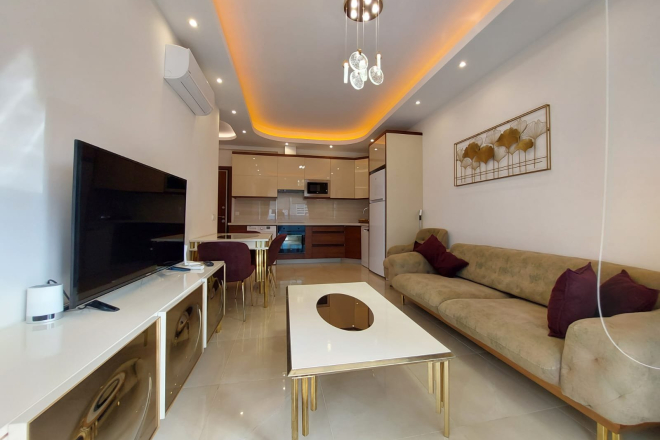 Modern Apartment in Mahmutlar with Resort Facilities and Rental Opportunity