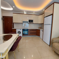 Modern Apartment in Mahmutlar with Resort Facilities and Rental Opportunity