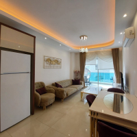 Modern Apartment in Mahmutlar with Resort Facilities and Rental Opportunity