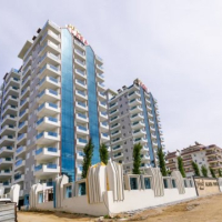 Modern Apartment in Mahmutlar with Resort Facilities and Rental Opportunity