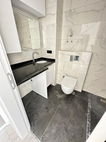 1+1 Apartment Just 100 Meters from the Sea in Prestigious Kargicak