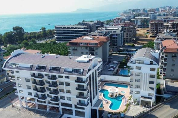 1+1 Apartment Just 100 Meters from the Sea in Prestigious Kargicak