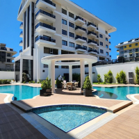 1+1 Apartment Just 100 Meters from the Sea in Prestigious Kargicak