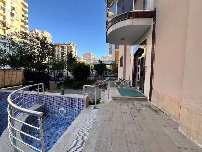 Move-in ready 1+1 apartment near the sea in Mahmutlar