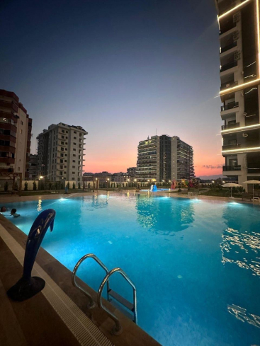 New 1+1 apartment in Mahmutlar with full on-site facilities