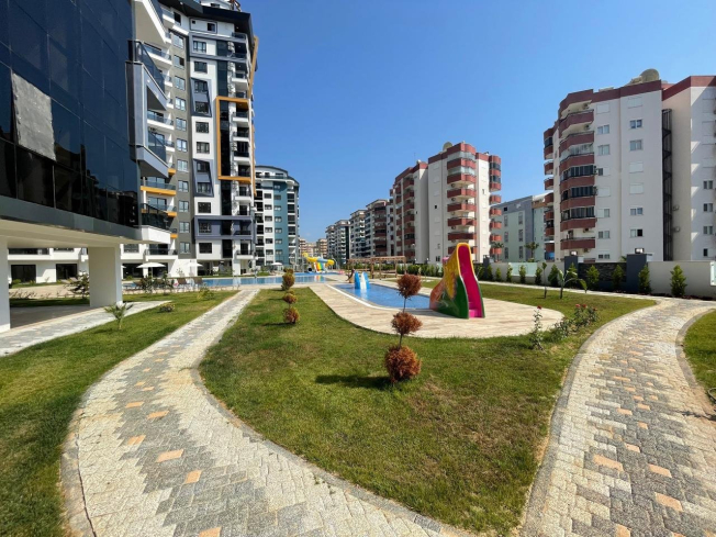 New 1+1 apartment in Mahmutlar with full on-site facilities