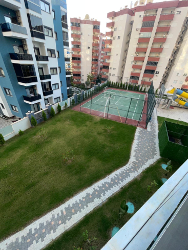 New 1+1 apartment in Mahmutlar with full on-site facilities