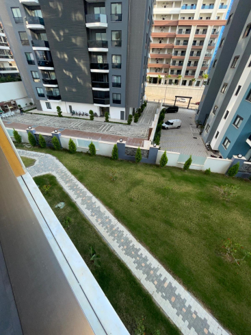 New 1+1 apartment in Mahmutlar with full on-site facilities