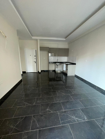 New 1+1 apartment in Mahmutlar with full on-site facilities