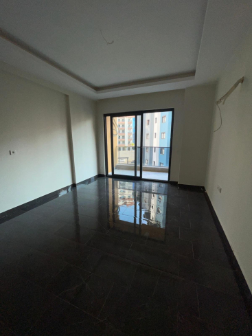 New 1+1 apartment in Mahmutlar with full on-site facilities