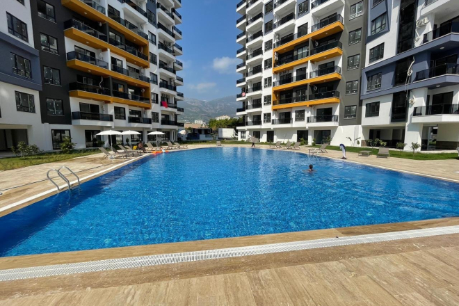 New 1+1 apartment in Mahmutlar with full on-site facilities